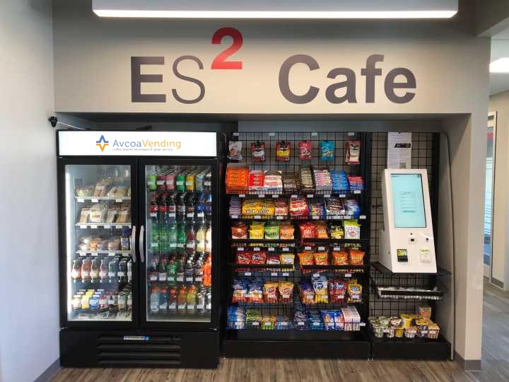 A fully stocked, modern micro market setup in a busy office by Avcoa Vending. Chicago, IL.