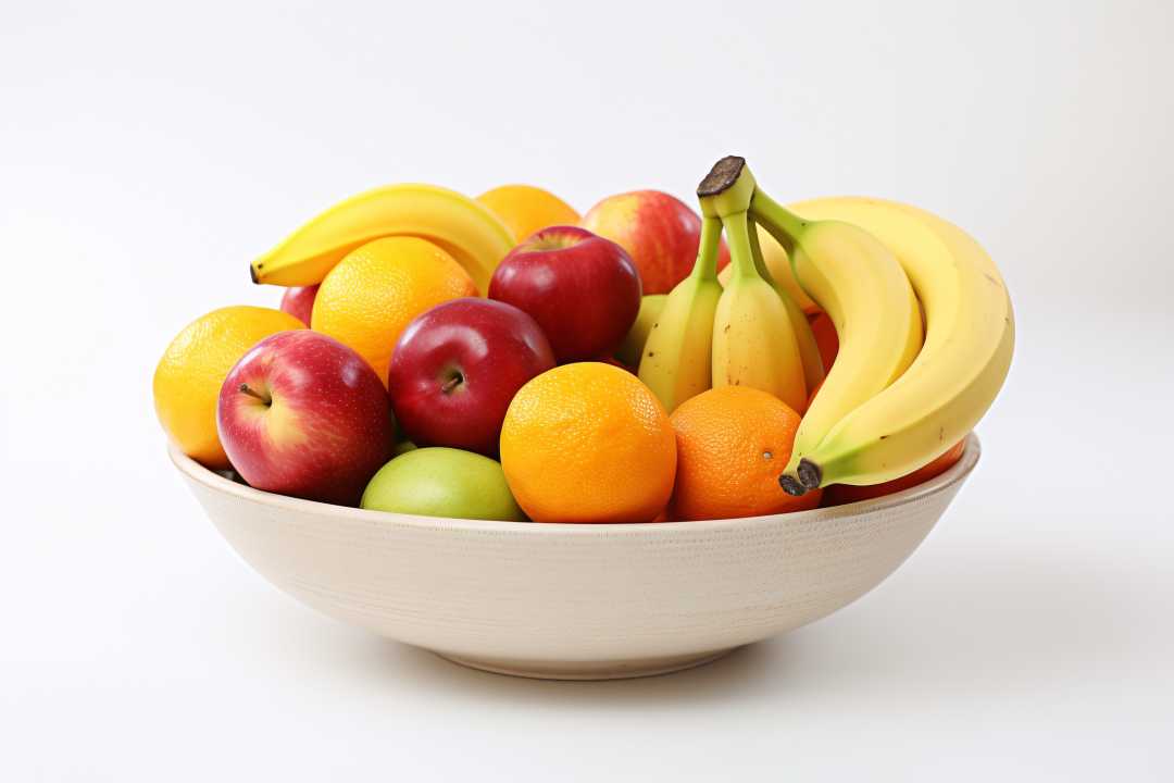 A bowl of refreshing oranges, hearty bananas, and delicious apples from the office pantry service from Avcoa Vending in Chicago, IL.